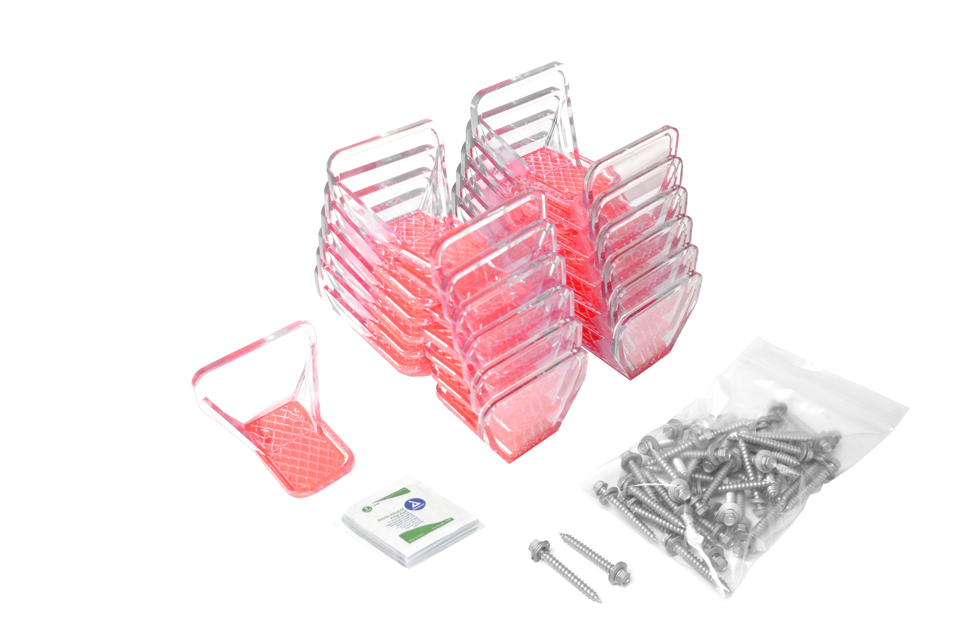 Set of clear plastic Snowguards with screws, and a small packet of wipes on a white background
