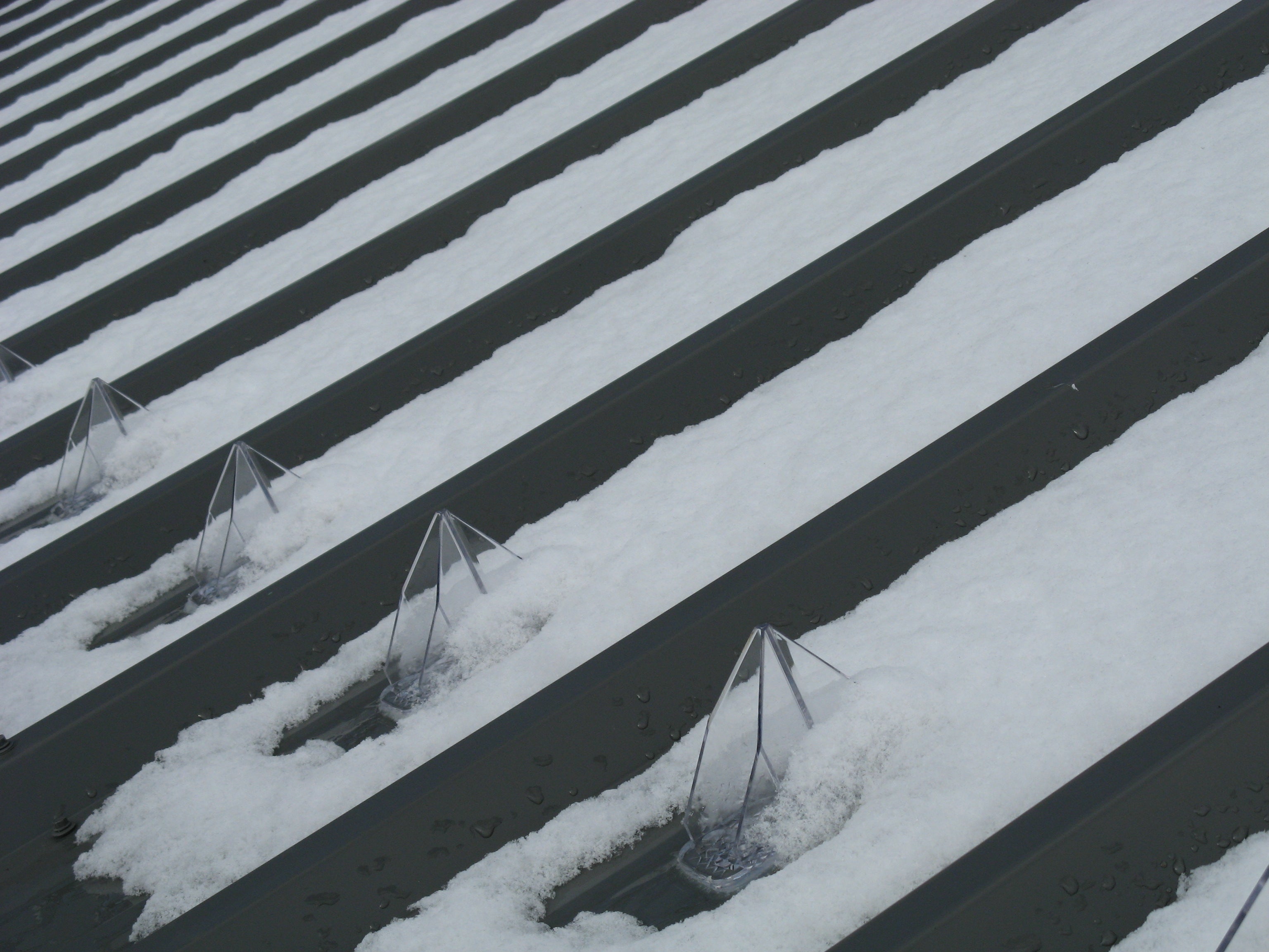 SnowBreaker 25 Adhesive-Mounted Snow Guards for Metal Roofs