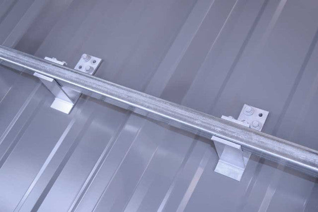 SnoBar Single Bar Screw Down Snow Rail on corrugated R-panel metal roof — galvanized Gator Coated square tube